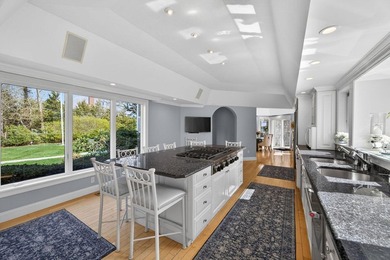 Set on 2.5 acres within the coveted Wings Neck community, this - photo 18