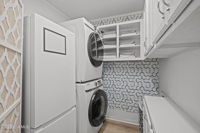 Experience coastal elegance in this beautifully upgraded