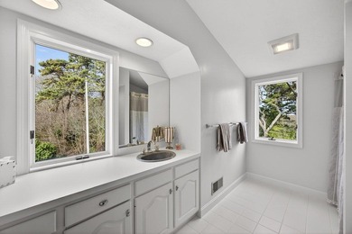 Set on 2.5 acres within the coveted Wings Neck community, this - photo 28