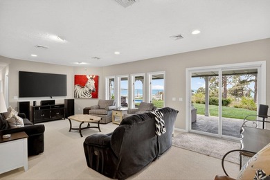 Set on 2.5 acres within the coveted Wings Neck community, this - photo 32