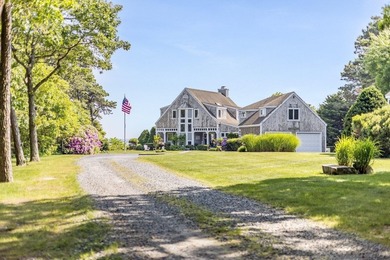 Set on 2.5 acres within the coveted Wings Neck community, this - photo 35