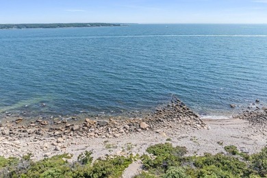 Set on 2.5 acres within the coveted Wings Neck community, this - photo 37