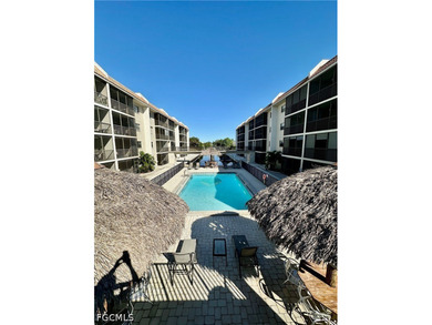 OR BEST OFFER! Gulf access condo with community boat slips and - photo 1