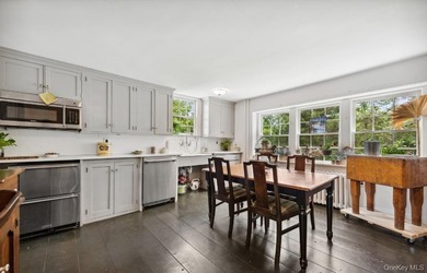 Welcome to 38 Landing Meadow Road, Smithtown. Nestled on almost - photo 6