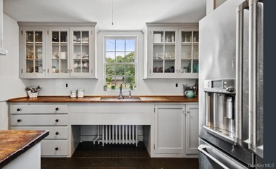 Welcome to 38 Landing Meadow Road, Smithtown. Nestled on almost - photo 8