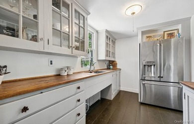 Welcome to 38 Landing Meadow Road, Smithtown. Nestled on almost - photo 9