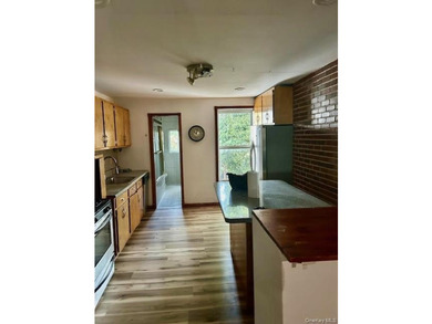 Fourth floor walk up on a tree lined block. Use of the backyard - photo 4