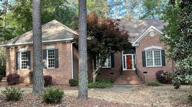 The expressive brick entrance staircase invites you into a well - photo 1