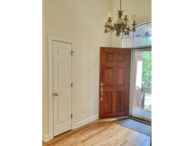 The expressive brick entrance staircase invites you into a well - photo 5