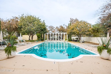 Located in the iconic Olympus Condominiums, this 2-bedroom