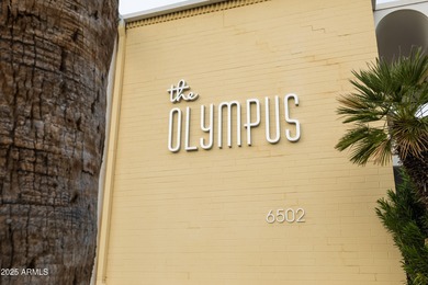 Located in the iconic Olympus Condominiums, this 2-bedroom