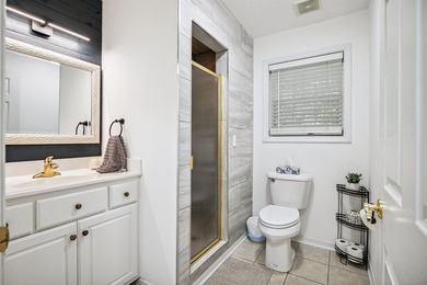 Experience the ultimate river-view retreat with this pristine - photo 19