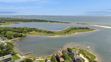 Tucked away in a secluded waterfront setting, this charming - photo 11