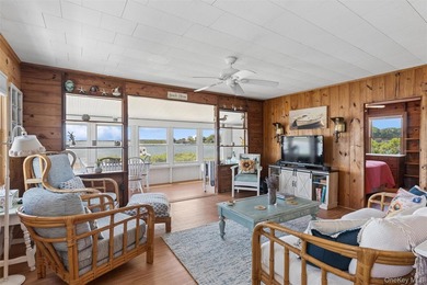Tucked away in a secluded waterfront setting, this charming - photo 12