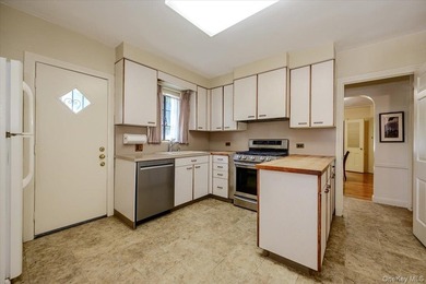 Welcome to 1264 Rhinelander Avenue, a rare custom-built side - photo 12