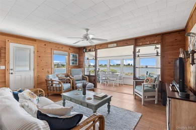 Tucked away in a secluded waterfront setting, this charming - photo 14