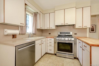 Welcome to 1264 Rhinelander Avenue, a rare custom-built side - photo 14
