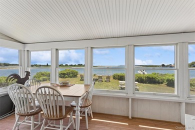 Tucked away in a secluded waterfront setting, this charming - photo 15