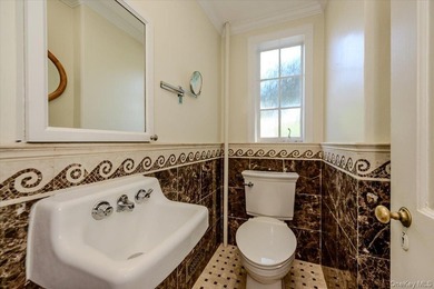 Welcome to 1264 Rhinelander Avenue, a rare custom-built side - photo 19