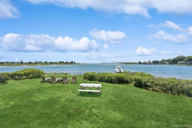 Tucked away in a secluded waterfront setting, this charming - photo 26