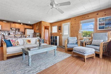 Tucked away in a secluded waterfront setting, this charming - photo 27
