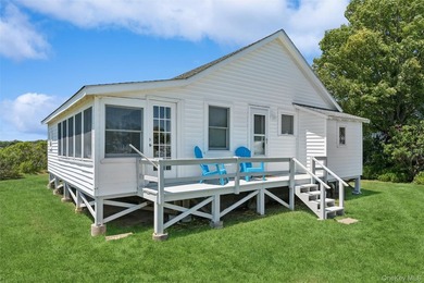 Tucked away in a secluded waterfront setting, this charming - photo 28