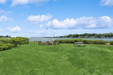 Tucked away in a secluded waterfront setting, this charming - photo 29