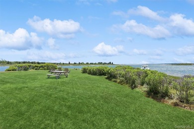 Tucked away in a secluded waterfront setting, this charming - photo 30