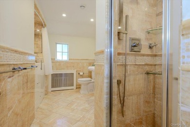 Welcome to 1264 Rhinelander Avenue, a rare custom-built side - photo 30