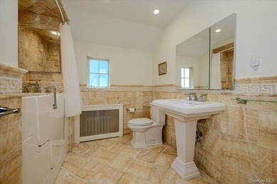 Welcome to 1264 Rhinelander Avenue, a rare custom-built side - photo 31