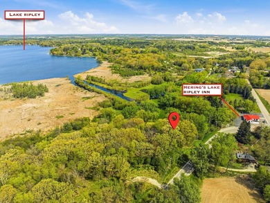 Perched atop a scenic knoll, this beautiful 1.5-acre wooded - photo 1