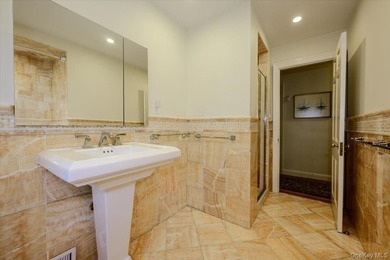 Welcome to 1264 Rhinelander Avenue, a rare custom-built side - photo 32
