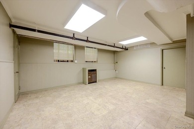 Welcome to 1264 Rhinelander Avenue, a rare custom-built side - photo 34