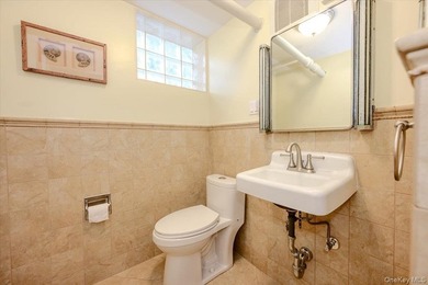 Welcome to 1264 Rhinelander Avenue, a rare custom-built side - photo 35