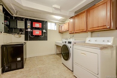 Welcome to 1264 Rhinelander Avenue, a rare custom-built side - photo 37
