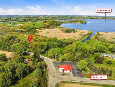Perched atop a scenic knoll, this beautiful 1.5-acre wooded - photo 7