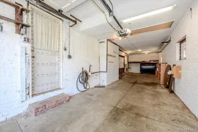 Welcome to 1264 Rhinelander Avenue, a rare custom-built side - photo 40