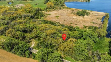 Perched atop a scenic knoll, this beautiful 1.5-acre wooded - photo 10