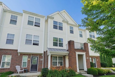 Welcome home to this beautifully maintained three-level townhome - photo 3