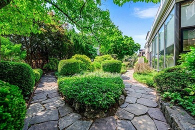 Welcome to 1264 Rhinelander Avenue, a rare custom-built side - photo 44