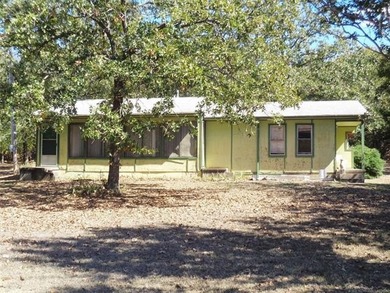Affordable Lakeside Getaway with Add-On Space & Great Potential! - photo 2