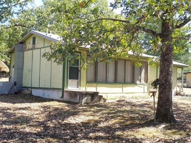 Affordable Lakeside Getaway with Add-On Space & Great Potential! - photo 3