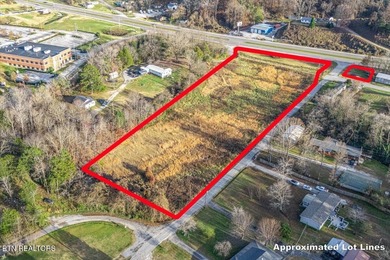 Cleared and level lot, zoned for commercial and residential use - photo 9