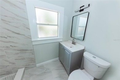 Thoughtfully updated from top to bottom, this move-in-ready home - photo 8