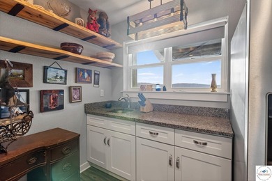 This 3-bedroom, 2.5-bath lakefront home offers over 2,000 square - photo 39