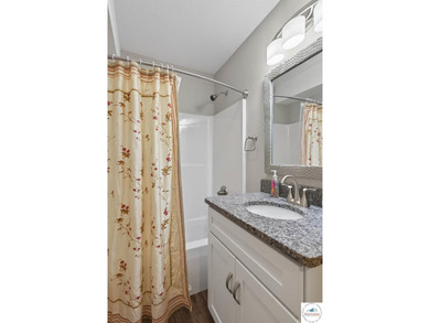 This 3-bedroom, 2.5-bath lakefront home offers over 2,000 square - photo 44