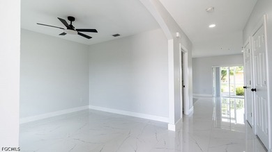 Beautifully renovated 4+Den, 2.5-bath home with a 2-car garage - photo 6