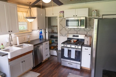 Welcome to this charming and well-maintained home offering a - photo 21