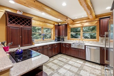 Stunning custom log home nestled on over 3 acres in the shadow - photo 11