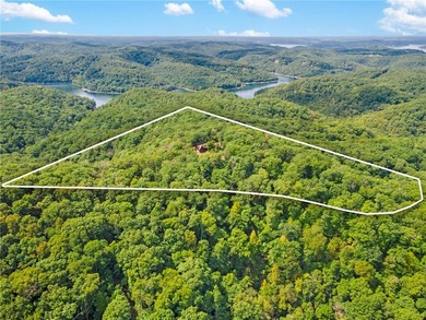 This beautiful cedar home, situated on over 20 acres, offers - photo 3